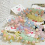 کش مو فنری مهره دار رنگ بندی پاستیلی