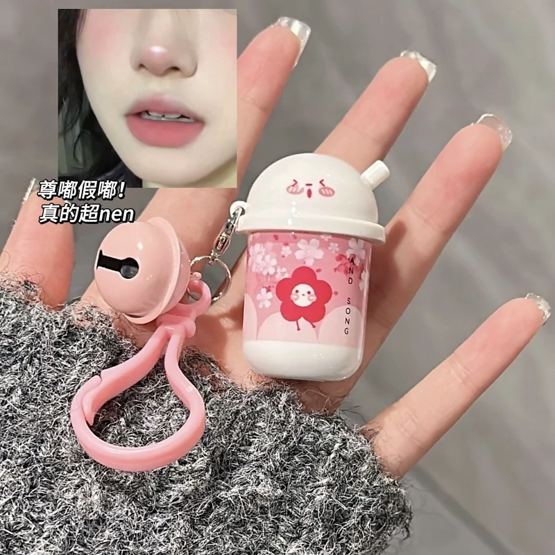 رژلب خامه ای تراول ماگ مدل زنگوله دار جا سوئیچی وارداتی